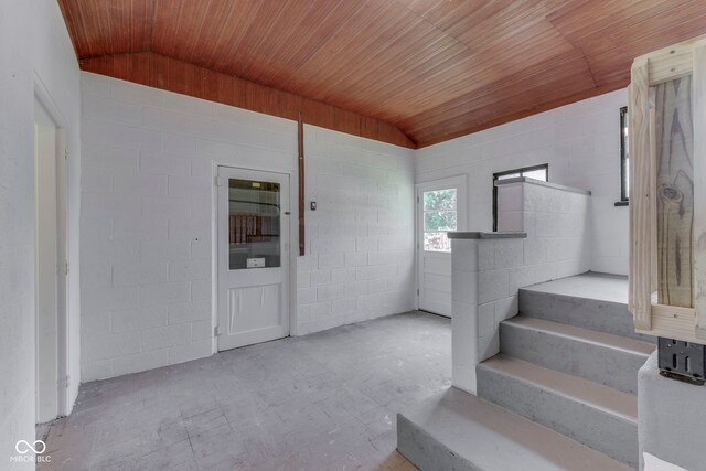 2245 N Ritter Ave, Indianapolis, IN 46218 - stairway with vaulted ceiling, wooden ceiling, and concrete block wall