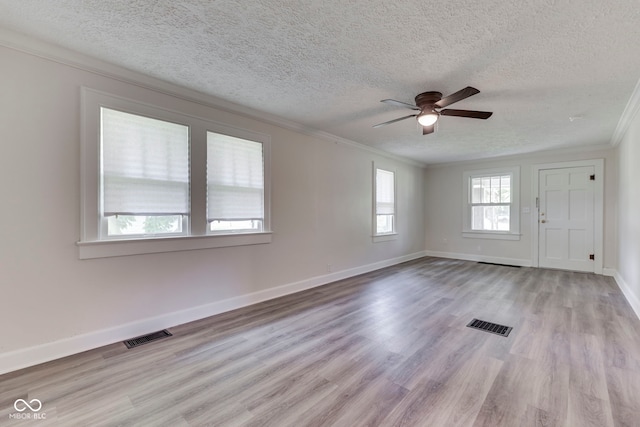 2245 N Ritter Ave, Indianapolis, IN 46218 - spare room featuring crown molding, a textured ceiling, wood finished floors, and a ceiling fan