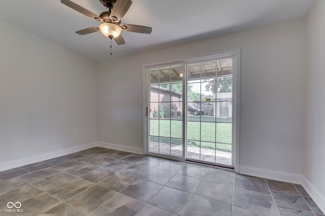 2245 N Ritter Ave, Indianapolis, IN 46218 - empty room with baseboards and ceiling fan