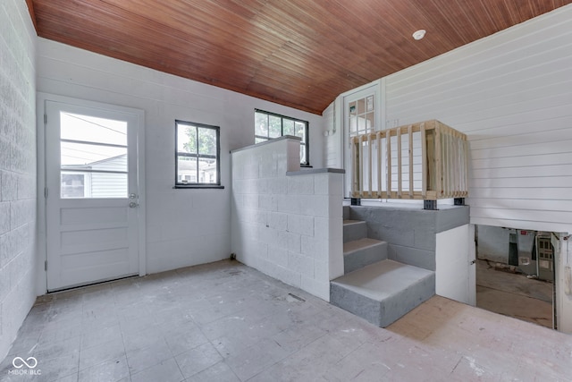 2245 N Ritter Ave, Indianapolis, IN 46218 - foyer entrance with wood ceiling, lofted ceiling, and concrete block wall