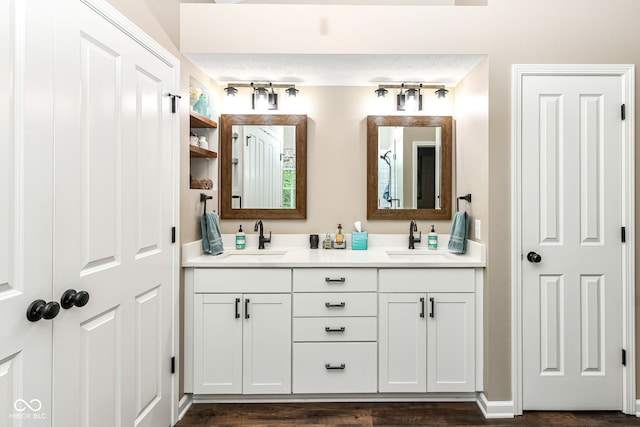 9825 Covington Blvd, Fishers, IN 46037 - bathroom with double vanity and wood finished floors