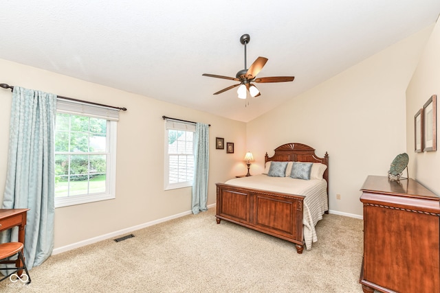 9825 Covington Blvd, Fishers, IN 46037 - bedroom with vaulted ceiling, light colored carpet, and ceiling fan