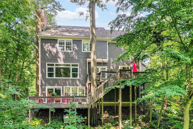9825 Covington Blvd, Fishers, IN 46037 - rear view of property featuring a wooden deck, a chimney, and stairs