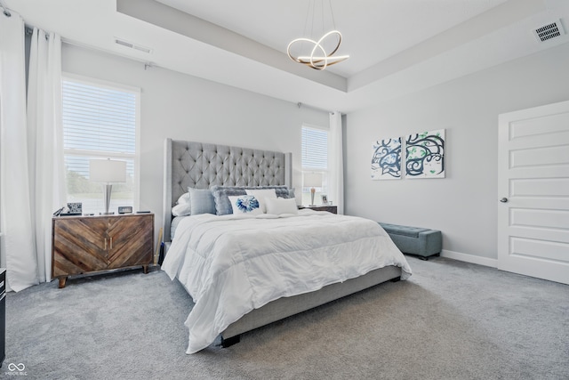 3839 Albert Ln, Bargersville, IN 46106 - bedroom with carpet floors, a chandelier, and a tray ceiling
