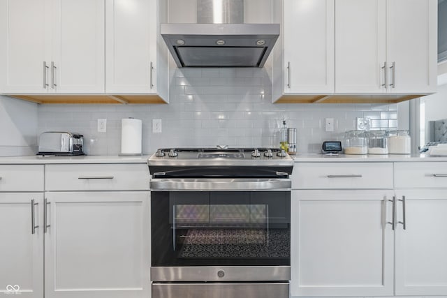 3839 Albert Ln, Bargersville, IN 46106 - kitchen featuring stainless steel stove, ventilation hood, tasteful backsplash, and white cabinets