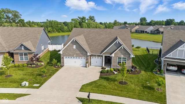 3839 Albert Ln, Bargersville, IN 46106 - craftsman-style home with driveway, a water view, brick siding, an attached garage, and a shingled roof