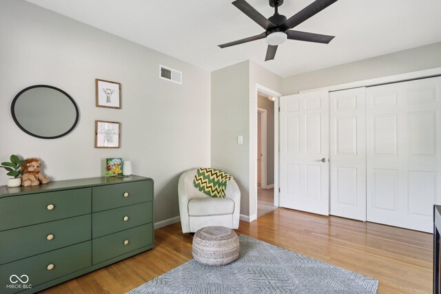 7029 Kingswood Cir, Indianapolis, IN 46256 - living area featuring ceiling fan and light wood-style flooring