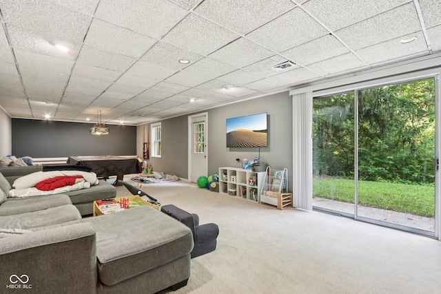 7029 Kingswood Cir, Indianapolis, IN 46256 - carpeted living room with billiards table and a drop ceiling