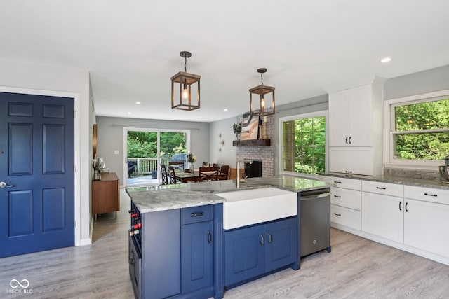 7029 Kingswood Cir, Indianapolis, IN 46256 - kitchen featuring dishwasher, healthy amount of natural light, white cabinetry, light wood-style floors, and recessed lighting