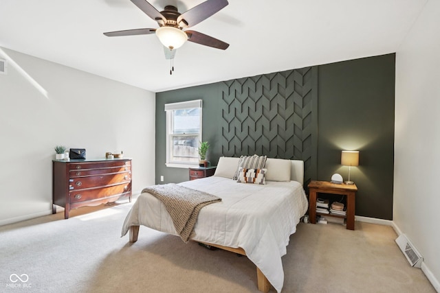7029 Kingswood Cir, Indianapolis, IN 46256 - bedroom with carpet, an accent wall, and a ceiling fan