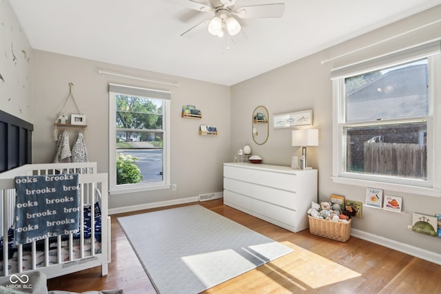 7029 Kingswood Cir, Indianapolis, IN 46256 - bedroom featuring wood finished floors and ceiling fan