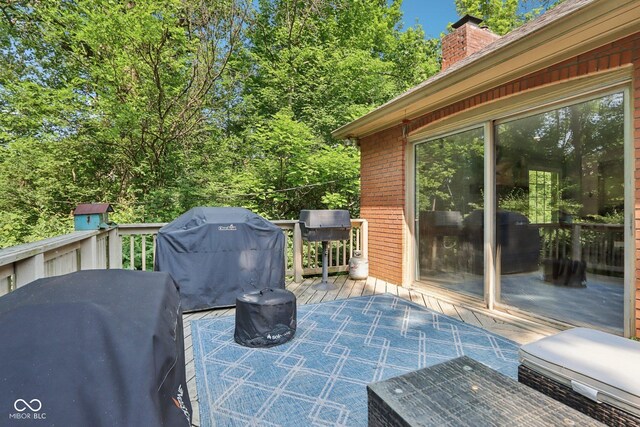 7029 Kingswood Cir, Indianapolis, IN 46256 - wooden terrace with grilling area
