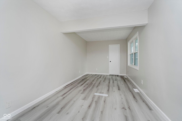 91 N Raceway Rd, Indianapolis, IN 46234 - spare room with wood finished floors and baseboards