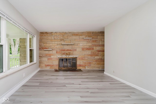 91 N Raceway Rd, Indianapolis, IN 46234 - unfurnished living room with a fireplace and wood finished floors