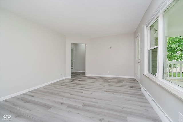 91 N Raceway Rd, Indianapolis, IN 46234 - empty room featuring light wood-style floors and baseboards