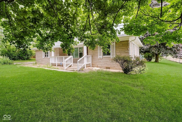 91 N Raceway Rd, Indianapolis, IN 46234 - view of front facade with crawl space and a front lawn