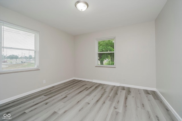 91 N Raceway Rd, Indianapolis, IN 46234 - spare room with wood finished floors and baseboards