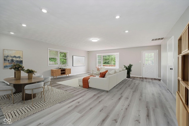 91 N Raceway Rd, Indianapolis, IN 46234 - living area featuring light wood-style floors and recessed lighting