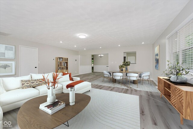 91 N Raceway Rd, Indianapolis, IN 46234 - living area featuring light wood-style flooring and recessed lighting