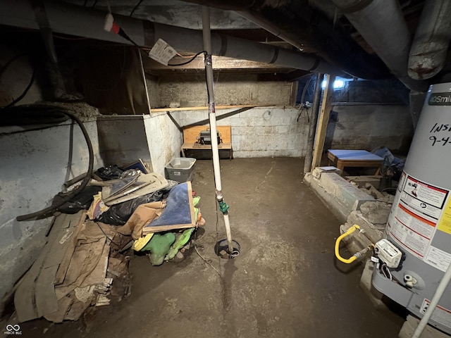 1809 E 13th St, Muncie, IN 47302 - unfinished basement featuring gas water heater