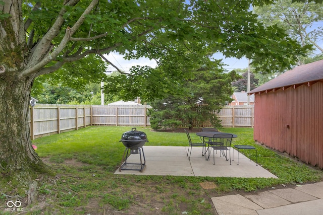 1944 Union St, Columbus, IN 47201 - fenced backyard with a patio and a fire pit