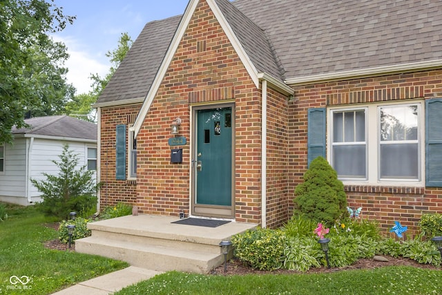 1944 Union St, Columbus, IN 47201 - doorway to property with brick siding and roof with shingles