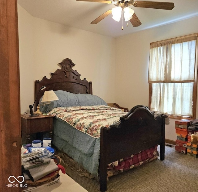 1674 W Independence St, Greensburg, IN 47240 - bedroom featuring multiple windows, carpet floors, and ceiling fan