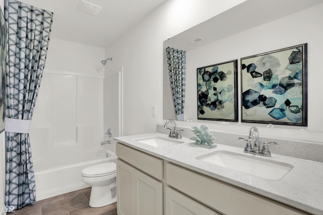 703 Penrose Pl, Danville, IN 46122 - bathroom featuring shower / bath combo, double vanity, and tile patterned floors