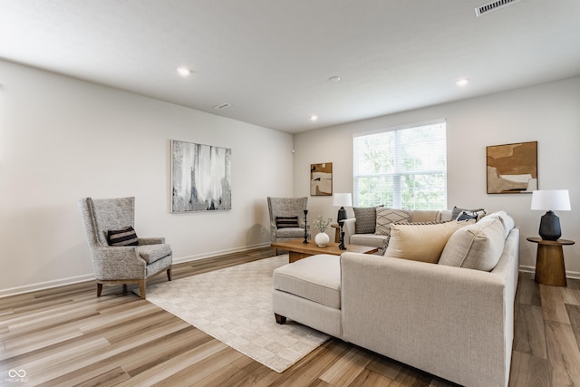 6537 Seabiscuit Rd, Whitestown, IN 46075 - living area featuring wood finished floors and recessed lighting