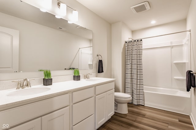 6537 Seabiscuit Rd, Whitestown, IN 46075 - full bath with double vanity, shower / bathtub combination with curtain, and wood finished floors