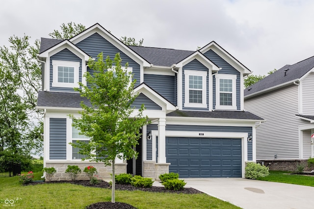 6537 Seabiscuit Rd, Whitestown, IN 46075 - traditional-style house featuring driveway, an attached garage, a shingled roof, and a front yard