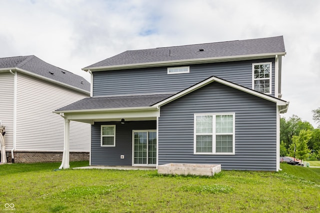 6537 Seabiscuit Rd, Whitestown, IN 46075 - back of property with a lawn and a shingled roof