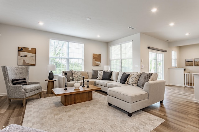 6537 Seabiscuit Rd, Whitestown, IN 46075 - living area featuring light wood finished floors and recessed lighting