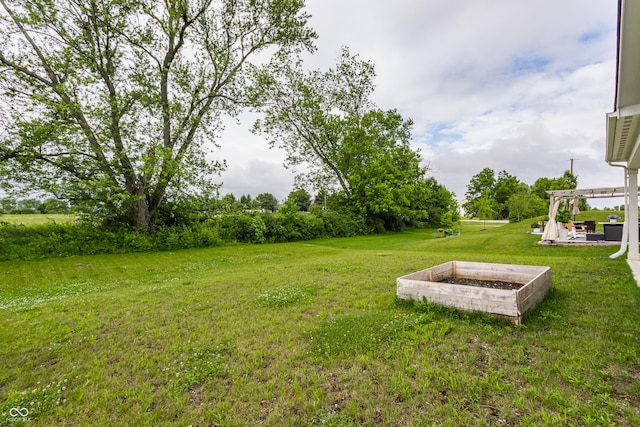 6537 Seabiscuit Rd, Whitestown, IN 46075 - view of grassy yard with a patio