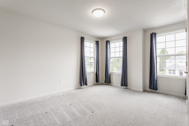 6537 Seabiscuit Rd, Whitestown, IN 46075 - empty room featuring plenty of natural light and carpet floors