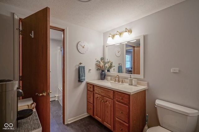 1524 Northcrest Dr, Anderson, IN 46012 - full bath featuring vanity, a baseboard radiator, a textured ceiling, a shower, and tile patterned flooring