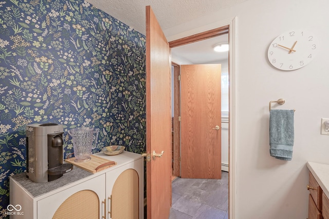 1524 Northcrest Dr, Anderson, IN 46012 - bathroom featuring wallpapered walls and vanity