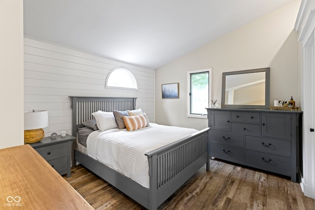 17320 Joliet Rd, Westfield, IN 46074 - bedroom with vaulted ceiling, dark wood-style floors, and wooden walls
