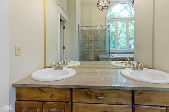17320 Joliet Rd, Westfield, IN 46074 - bathroom with double vanity, plenty of natural light, tiled shower, and a tub to relax in