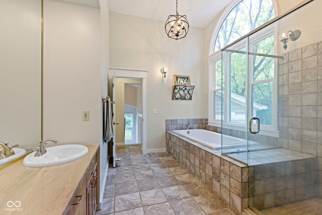 17320 Joliet Rd, Westfield, IN 46074 - full bath with plenty of natural light, vanity, a bath, and stone finish floors