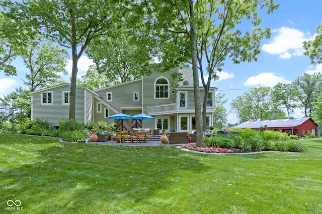 17320 Joliet Rd, Westfield, IN 46074 - back of property featuring an outdoor living space, a patio area, a yard, and a balcony