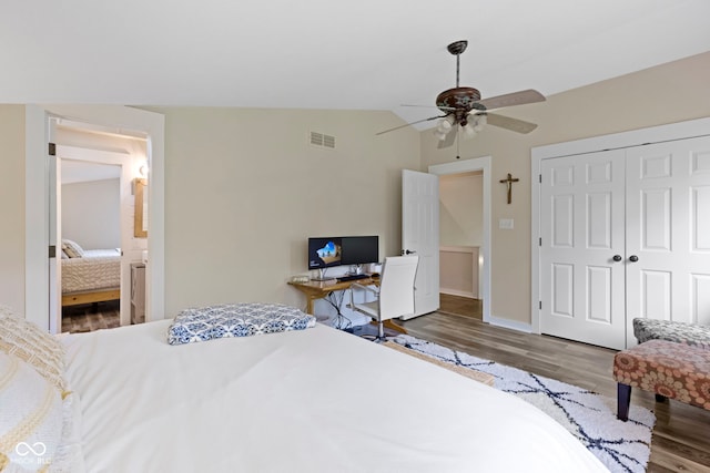 17320 Joliet Rd, Westfield, IN 46074 - bedroom featuring wood finished floors, vaulted ceiling, a closet, ensuite bathroom, and ceiling fan
