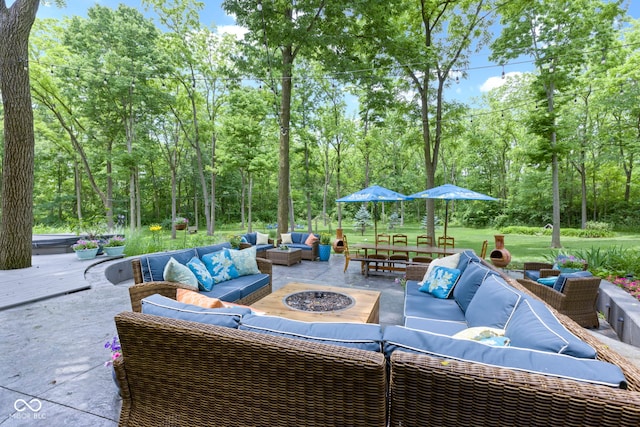 17320 Joliet Rd, Westfield, IN 46074 - view of patio featuring an outdoor living space with a fire pit and view of wooded area