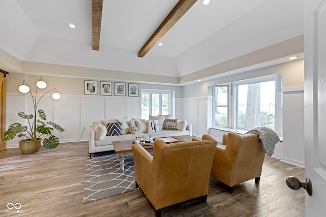 17320 Joliet Rd, Westfield, IN 46074 - living area featuring a decorative wall, wood finished floors, a wainscoted wall, and recessed lighting