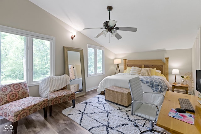 17320 Joliet Rd, Westfield, IN 46074 - bedroom featuring lofted ceiling, multiple windows, wood finished floors, and a ceiling fan