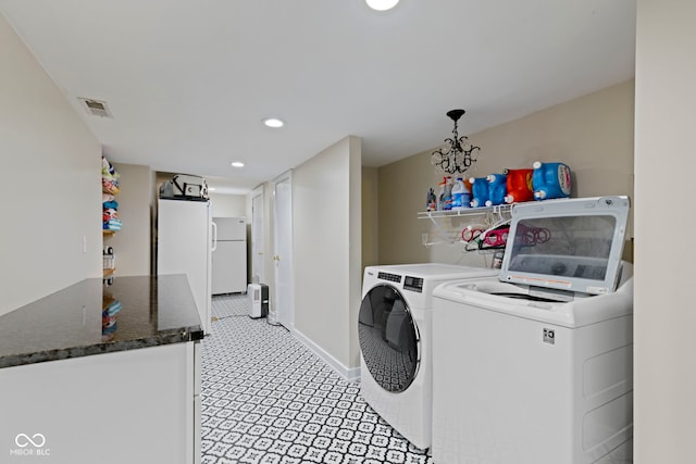17320 Joliet Rd, Westfield, IN 46074 - laundry room featuring independent washer and dryer and recessed lighting
