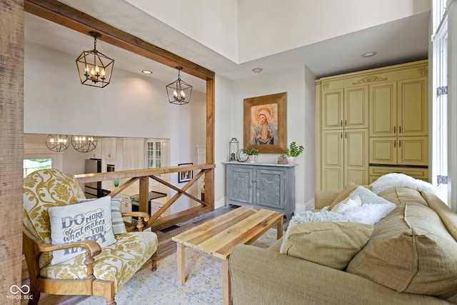 17320 Joliet Rd, Westfield, IN 46074 - living area with a chandelier, a towering ceiling, recessed lighting, and wood finished floors