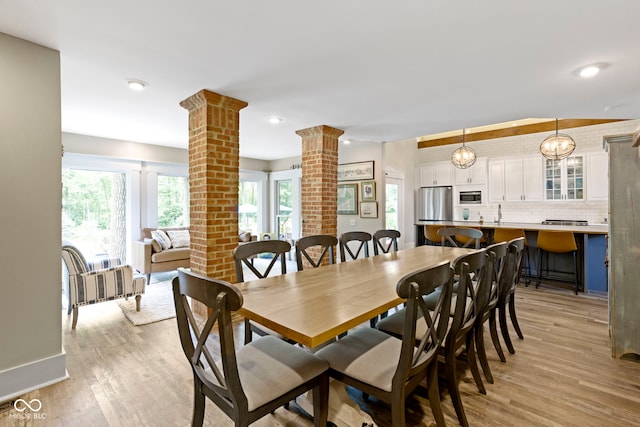 17320 Joliet Rd, Westfield, IN 46074 - dining space with ornate columns, light wood-type flooring, and recessed lighting