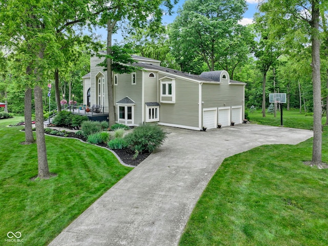 17320 Joliet Rd, Westfield, IN 46074 - view of front facade featuring concrete driveway, a front lawn, and view of scattered trees