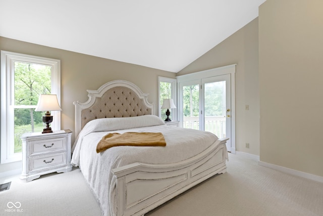 17320 Joliet Rd, Westfield, IN 46074 - bedroom with access to outside, light colored carpet, multiple windows, and vaulted ceiling